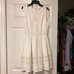 Francesca’s white dress with lace detailing